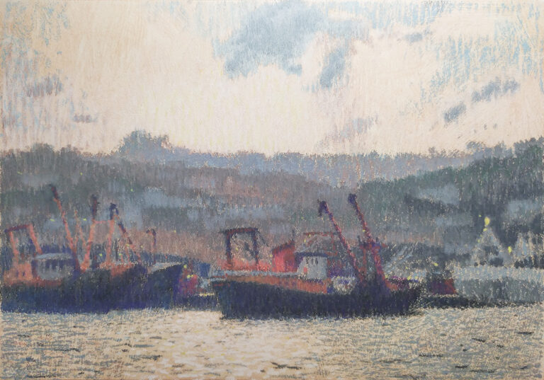 view across Newlyn harbour evening light